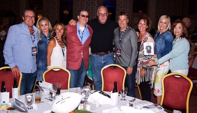 Andrew Hillman at a fundraiser with Dallas Cowboy Randy White